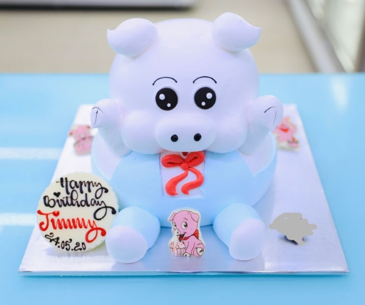 Bánh sinh nhật tạo hình con lợn với màu xanh da trời