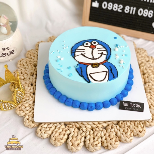 Bánh sinh nhật vẽ hình Doraemon cho bé trai 1 tuổi