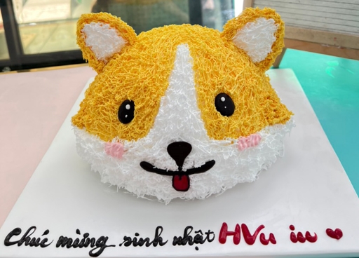 Tạo hình chú chó vàng cute bằng bánh sinh nhật