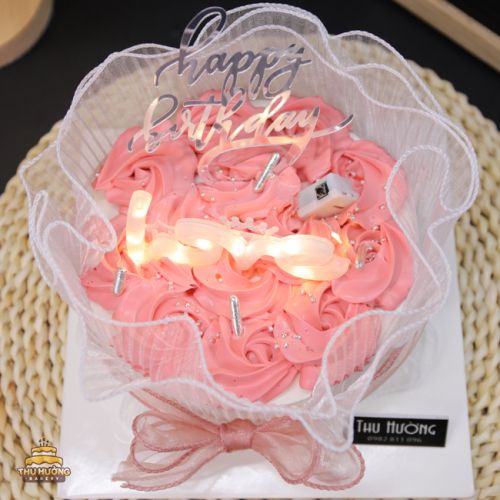 Bánh sinh nhật mini màu hồng trang trí đèn xinh